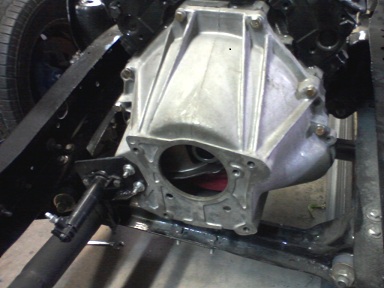 you can't really see in the pic but the push rod on the slave fits right into the stock early 90's mustang clutch fork